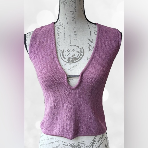 Knit Midriff Top with Plunge Neckline
EUR 44 (runs small)
Like New / Never Worn - Picture 1 of 8